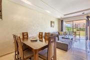 Luxury Garden-Level Apartment with Poolside Serenity