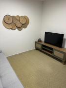 Lindo apartamento térreo, recém reformado em Bertioga