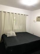 Quarto econômico 50 metros da praia