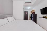 Enjoy Living and Warm Studio at Serpong Garden Apartment By Travelio