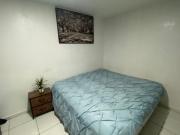 Habitación en departamento con vista a la ciudad