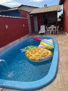 Casa para temporada em condomínio Orla 500, com piscina em unamar - Cabo Frio