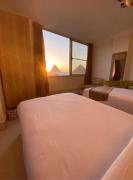 Tut View the pyramids