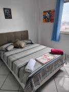 Quarto em apto em ótima localização