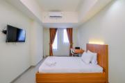 Comfy Studio at Evenciio Margonda Apartment By Travelio