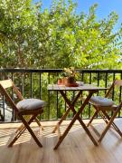 The Cozy House by Kura Homes