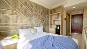 Warm and Homey Studio at Sky House Alam Sutera Apartment By Travelio