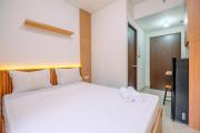 Simply and Nice Studio at Transpark Cibubur Apartment By Travelio