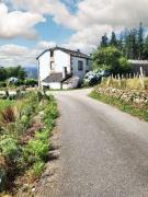 Charming house in Ourol with mountain view, large garden.