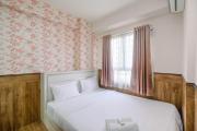 Minimalist and Comfy 2BR at Titanium Square Apartment By Travelio