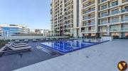 Vogue Vacation Homes, Arjan Jwelz by Danube near Miracle and Butterfly Garden, Studio Apartment with Balcony and Vibrant Community View, Access toAmenities