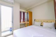 Comfortable and Tidy Studio at Titanium Square Apartment By Travelio