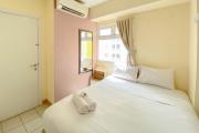 Good Deal and Well Design 2BR Green Pramuka City Apartment By Travelio