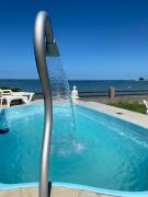 Pé na Areia Budha House