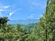 A true MOUNTAIN PARADISE- Classic 1BR log cabin, hot tub, and foosball! View!
