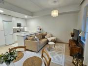 Stylish top floor ap, with private parking, next to a tram stop