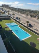 Claudia Luxury Apartment near the beach with a pool, gym, and secure gated parking