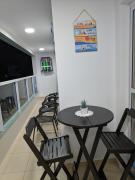 Apto completo com varanda gourmet a 50 mt da praia