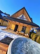 Łykolańczyk-Chatki z JACUZZI