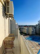 Apartamento Oura com piscina e vista mar