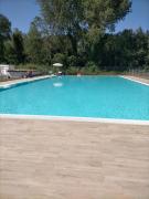 GuestHost - Seaside Apartment with swimming pool and parking