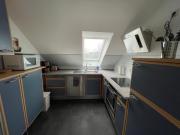 Apartment für Arbeiter und Reisende, Wilhelm-Busch