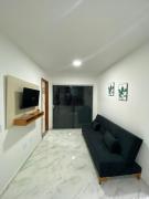 Beautiful apartamento novo equipado a 2 quadras da praia