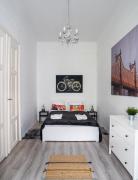 In Budapest, we would like to welcome you to our large, modern, and quiet apartment with AC and Netflix, located very near the world-famous New York Cafe