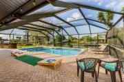 Villa Mahana - Family-friendly salt water electric-heated pool home wGulf access - SWFL Rentals