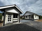 Top Tanah Merah