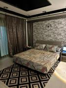 A private room exclusively for men, offering comfort and convenience for a relaxing stay