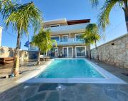 Odyssea Seaside Apartment with Sea View and Pool