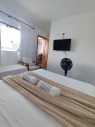 Suíte 24 família Praia de Leste