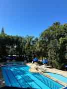 Flat Amarilis em Riviera São Lourenço - com arrumação, café manhã, wifi privat, toalhas praia e piscina e enxoval completo com trocas toalhas