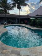 Casa dos fundos em condomínio