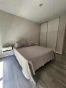 Depto céntrico en Pinamar con parrilla y piscina en la terraza