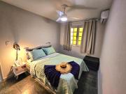 Refúgio na Praia Grande com Ar-Condicionado