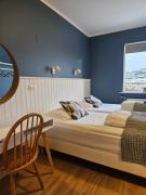 Hótel Laugarhóll with natural hot spring