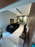 Apartamento Luxo Moderno e Conveniente com Garagem