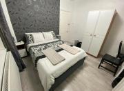 Modern bedroom with shared bathroom