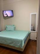 Quarto atrás do Copacabana Palace 3 pessoas