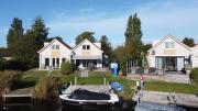 familienfreundliches Ferienhaus mit Ruderboot, Sauna und Kamin sowie E-Ladestation