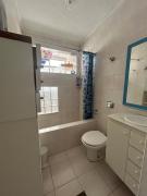 Kitnet com ar condicionado na quadra da praia e wifi