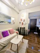 Charming Comfort 1BR at Air Residences Makati with wifi & netflix