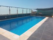 Shared cauchi corner house with roof top pool and pay per use aircondition