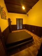 Casa com Piscina e com rio cristalino em Boiçucanga