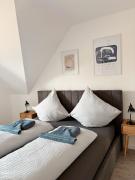 Ferienwohnung KÖÖK Heimathafen - Modern, Balkon, Strandnah