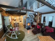 Villa Miilu Iso-Syöte hirsimökki järven rannalla