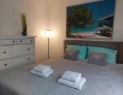 Apartament JK 47 A z miejscem postojowym w garażu