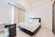 Best Modern 2BR at Casa de Parco Apartment By Travelio